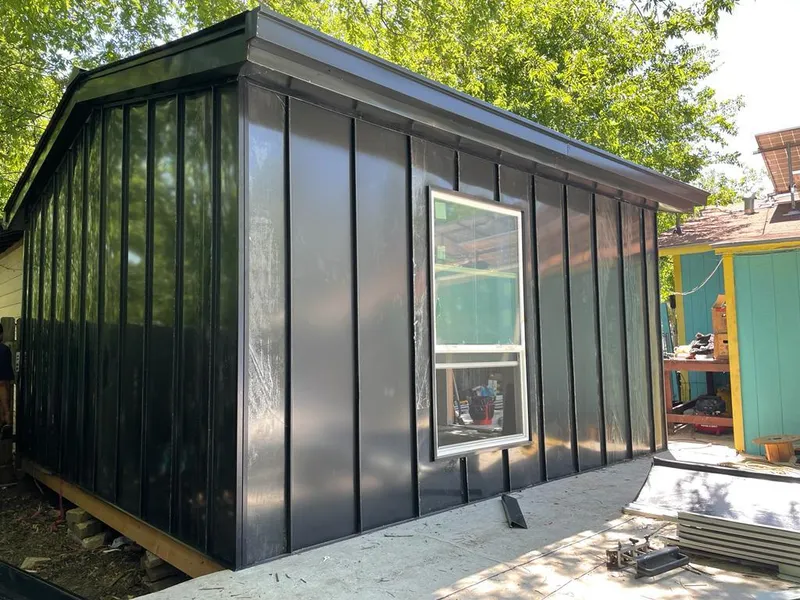 Black standing seam metal wall panels for Roof Inspection in Carrboro
