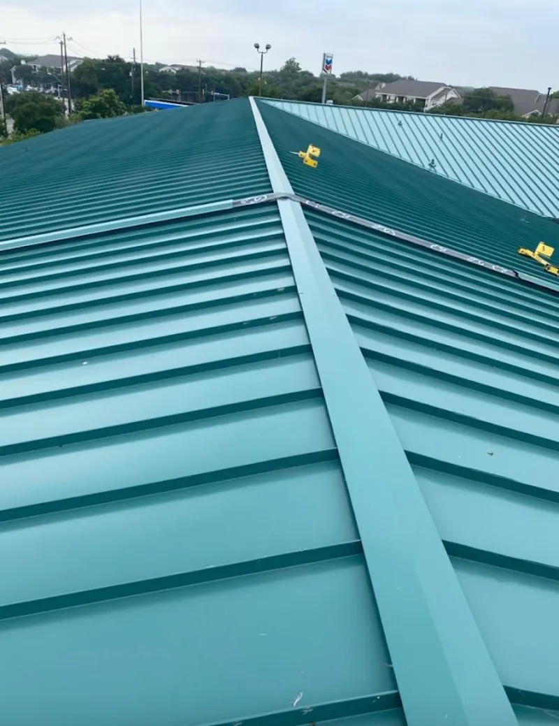 Green commercial metal roof ridge and valley for Metal Roof Repair in Carrboro
